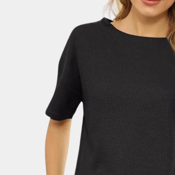 Women's Black Athletic Shorts Set featuring a black t-shirt, showcasing its quick-dry and breathable fabric, ideal for activewear.
