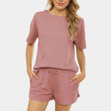 Women's black athletic shorts set featuring a rose-colored top in size XL, designed for quick-dry and breathable activewear.
