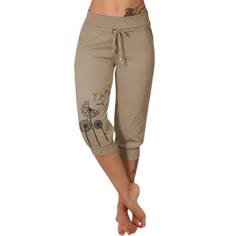 Women's black capri pants with a white dandelion print, shown in Braun color and size 5XL; casual summer lightweight design.