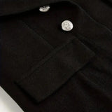 Women's black double-breasted military blazer featuring silver buttons, with detailed stitching on the sleeves and a structured collar.