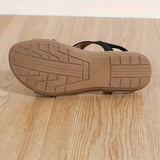 Women's black wedge sandals with elegant floral embroidery, featuring a comfortable design suitable for outdoor use.