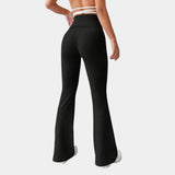 Women's black high-waist flare yoga pants with a moisture-wicking fabric, showcasing a comfortable fit ideal for athletic activities.