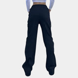 Women's black high-waist slim fit cargo pants featuring zipper pockets, showcasing a trendy and functional design suitable for casual wear.