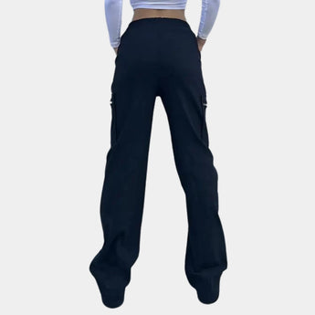 Women's black high-waist slim fit cargo pants featuring zipper pockets, showcasing a trendy and functional design suitable for casual wear.