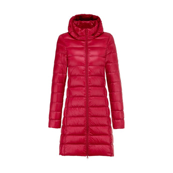 Women's long quilted insulated puffer coat in black with a hood, featuring a sleek design and long sleeves.