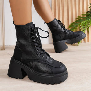 Women's black lace-up combat boots with chunky heel platform, shown in color Nero and size 42, featuring a stylish and fashionable design.