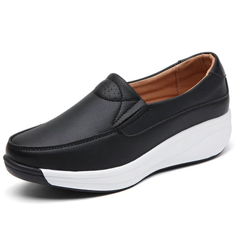 Women's black leather platform loafers featuring a stylish and comfortable design.