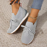 Women's gray breathable running sneakers with mesh material, shown in size 43. The lightweight, slip-on design is fashionable and cool, suitable for walking and running.