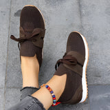 Women's black mesh breathable running sneakers, lightweight slip-on design, shown in brown color, size 43.