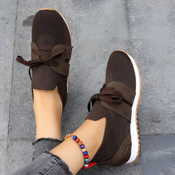Women's black mesh breathable running sneakers, lightweight slip-on design, shown in brown color, size 43.