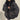
A women's black oversized bomber jacket in size 2XL, featuring a trendy puffer design ideal for winter. The coat has a prominent collar, long sleeves, and a comfortable waist fit, providing both style and warmth.