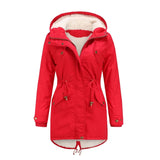 Red women's parka with a thermal and waterproof design, featuring a faux fur hood, long sleeves, and a structured collar.