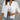 Women's white quilted bomber jacket in size 3XL, showcasing the shoulder and sleeve details, suitable for trendy fall layering.
