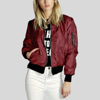 Women's red satin bomber jacket in size 2XL, featuring a lightweight zip-up design with a collar, long sleeves, and a fitted waist, styled as trendy outerwear.