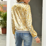 Women's black sequin bomber jacket with shiny glitter detail and zip-up front, showcasing its long sleeves and waist-length fit.
