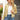 
A women's black sequin bomber jacket with a shiny glitter finish and zip-up closure, displayed in a gold color, size 2XL. The jacket features long sleeves and a comfortable fit.