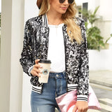 
A black sequin bomber jacket for women featuring a shiny glitter finish. The jacket is a zip-up style, shown in a 2XL size.