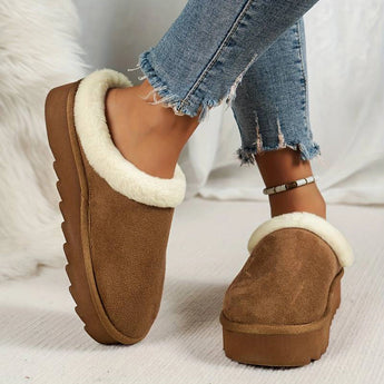 Women's black shearling fuzzy lined platform loafers with a stylish design, featuring a faux shearling lining and a platform sole for added height and comfort.