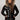 Women's black shiny puffer jacket with fur hood, glossy winter coat, black color, 3XL size, model showcasing the jacket.