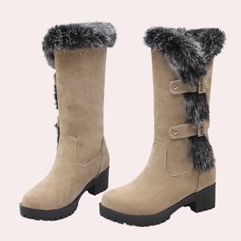 Women's knee-high winter boots in black suede with fur trim, shown in beige color variant, size 42, featuring a sleek design suitable for cold weather.