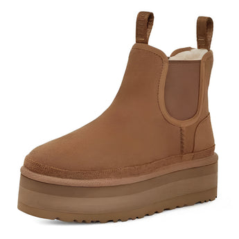 Brown women's suede platform Chelsea ankle boots with a slip-on design, featuring a comfortable fit and suitable for outdoor wear, styled as a fashionable accessory.