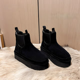 Women's black suede platform Chelsea ankle boots, featuring a slip-on design suitable for winter wear, shown in size 40.