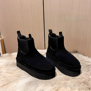 Women's black suede platform Chelsea ankle boots, featuring a slip-on design suitable for winter wear, shown in size 40.