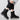 Women's black suede waterproof ankle boots with fur lining, worn by a person standing, showcasing the boots' cozy and stylish design ideal for winter wear.