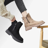 Women's black suede waterproof fur-lined winter ankle boots with a stylish design, showcasing soft fur lining and sturdy soles suitable for winter fashion and protection.