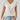 Women's white V-neck relaxed fit tee in XXL size, featuring a soft and stylish casual design with short sleeves.