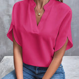Women's black v-neck blouse with split sleeves, designed for an elegant and professional summer work look.