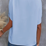Women's black V-neck split sleeve blouse designed for an elegant summer work look. The blouse features a flattering neckline with stylish split sleeves, perfect for a fashionable and professional appearance.