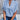 Elegant blue blouse for women in XXL size, featuring a V-neck and unique split sleeves design.