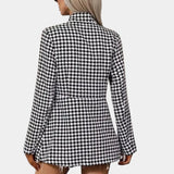 Women's black and white houndstooth blazer, featuring a classic tartan pattern, long sleeves, and a structured shoulder design, ideal for office wear.