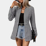 Women's black and white houndstooth blazer in XL, featuring a trendy office style with a classic tartan pattern. The blazer has structured shoulders, long sleeves, and a tailored waist for a sophisticated look.