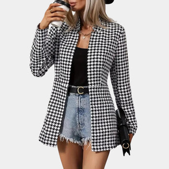 Women's black and white houndstooth blazer in XL, featuring a trendy office style with a classic tartan pattern. The blazer has structured shoulders, long sleeves, and a tailored waist for a sophisticated look.