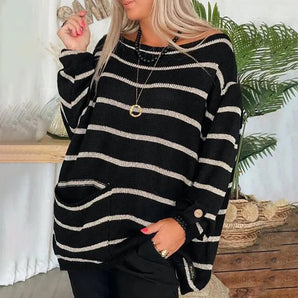 Women's black and white off-shoulder striped sweater with button detail, featuring long sleeves and designed for a plus size fit.