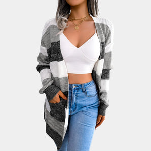 Women's black and white plaid lightweight knit cardigan with a collar, long sleeves, and a relaxed fit, perfect for fall fashion.
