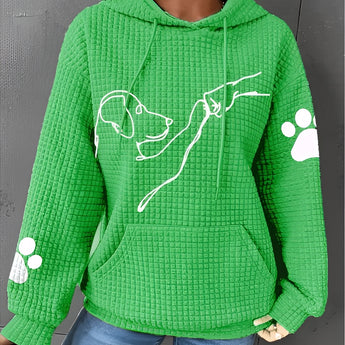 
A green women's hoodie featuring a cozy pet-themed design with dog prints, displayed in a 4XL size. The hoodie is styled with long sleeves and is paired with jeans, showcasing a casual and comfortable outerwear look.