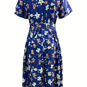 Women's blue floral knee-length A-line summer dress with cap sleeves, featuring a vibrant electric blue color and floral pattern, suitable for casual wear.