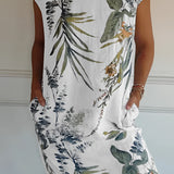 Women's white knee-length dress with short sleeves, featuring a floral pattern and lightweight fabric ideal for summer, shown on a mannequin.