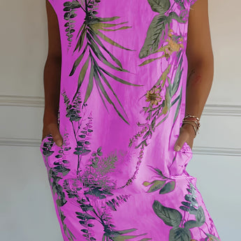Women's 5XL blue floral knee-length dress in a lightweight fabric, featuring a tunic style with short sleeves and a comfortable fit, ideal for summer wear.