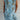 Women's lightweight summer tunic dress in Azzurro, featuring a blue floral pattern, knee-length design, and short sleeves.