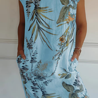 Women's lightweight summer tunic dress in Azzurro, featuring a blue floral pattern, knee-length design, and short sleeves.