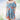 Women's blue floral off-shoulder summer mini dress in XL size, featuring a vibrant floral pattern against a white background. The dress is a one-piece garment with an off-the-shoulder design, perfect for warm weather outings.