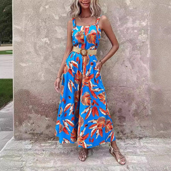 Women's blue floral wide-leg jumpsuit featuring a one-piece design with sleeveless arms, shoulders, and a round neck, ideal for resort fashion.