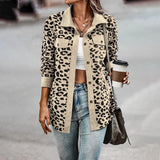 Women's blue leopard print shirt featuring a chic and stylish animal print design, shown in the apricot color variant. The shirt is displayed on a mannequin with visible details of the shoulder, neckline, and long sleeves. The fabric has a soft and elegant leopard pattern, highlighted in shades of blue and beige.