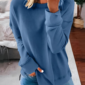 Women's blue long-sleeve casual sweatshirt, featuring pockets, in size 4XL. The sweatshirt is azure in color with a relaxed fit and designed for comfort.