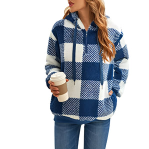 Women's blue plaid fleece jacket in 5XL size, featuring a cozy zip-up design suitable for winter wear, with a tartan pattern and visible hand and arm details.