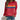 Women's blue rainbow stripe crew neck long-sleeve sweatshirt paired with jeans. The sweatshirt features colorful stripes and a comfortable fit.